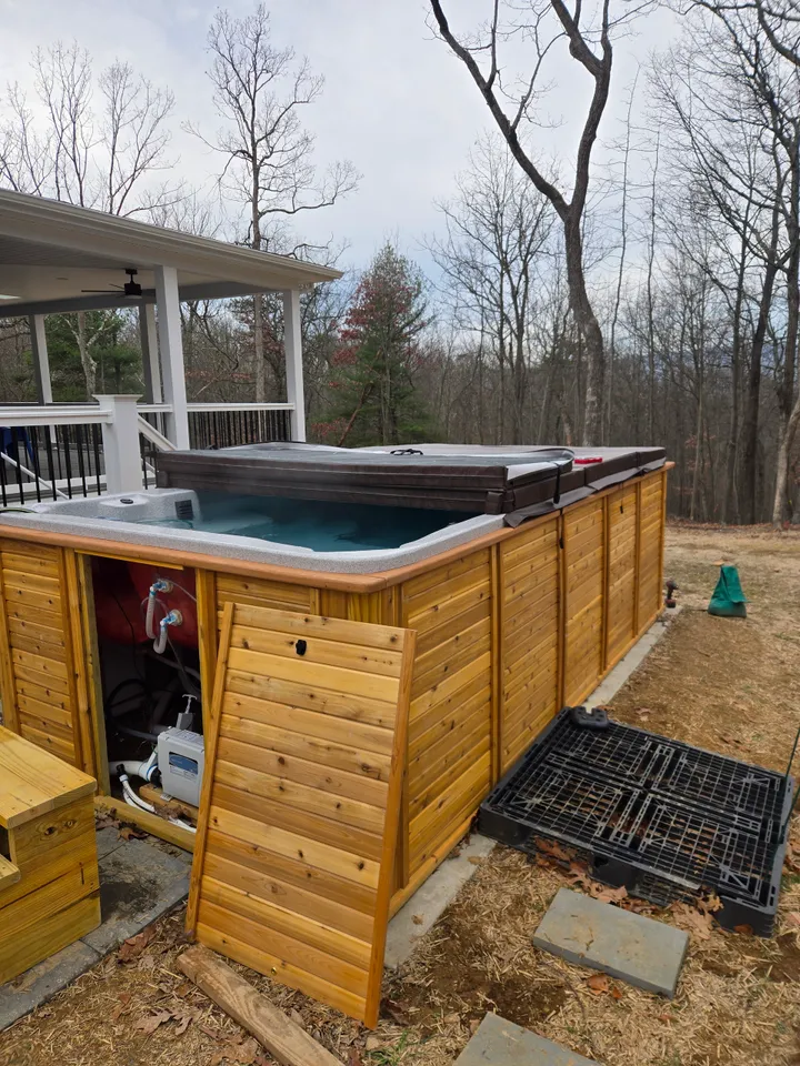 Cedar-cabinet swim spa installed and running by Spa Saviors in Pennsylvania